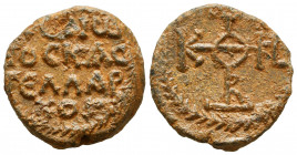 Byzantine lead seal of N. kastellarches
(7th cent.). 



Weight: 12,2 gr
Diameter: 23,9 mm