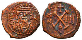 Maurice Tiberius. A.D. 582-602. AE follis. 

Reference:
Condition: Very Fine


Weight: 3,8 gr
Diameter: 19,3 mm