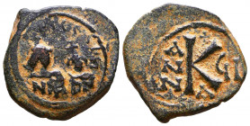 Byzantine Coins , Ae

Reference:
Condition: Very Fine

Weight: 6,1 gr
Diameter: 25,1 mm