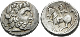 CELTIC, Eastern Celts. Circa 2nd century BC. Tetradrachm (Silver, 24 mm, 12.59 g, 11 h), imitating Philip II of Macedon. Celticized head of Zeus to ri...