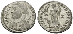 Licinius I, 308-324. Follis (Bronze, 19 mm, 3.20 g, 12 h), Nicomedia, 317-320. IMP LICINIVS AVG Laureate and draped bust of Licinius to left holding m...