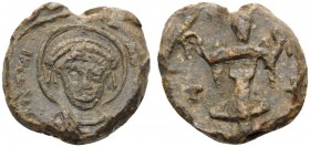 Justinian I, 527-565. Seal (Lead, 19 mm, 5.61 g, 12 h). Nimbate, helmeted, and cuirassed facing bust. Rev. Angel standing facing, holding two wreaths;...