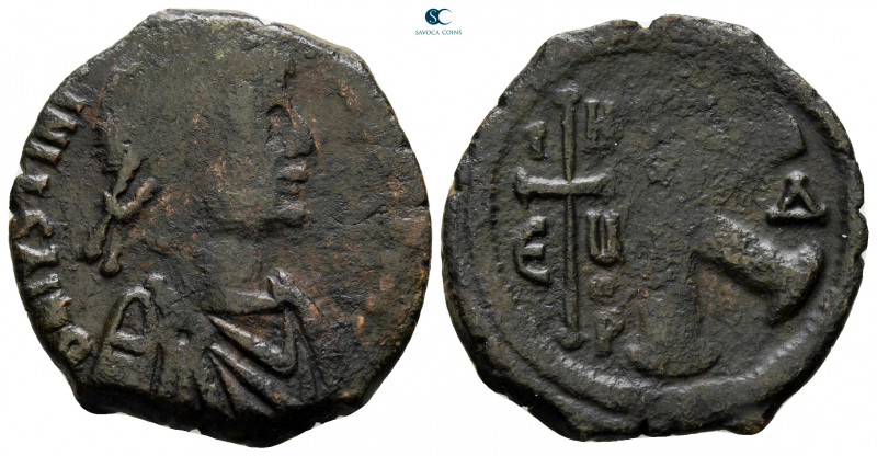Justinian I AD 527-565. Theoupolis (Antioch)
Half Follis or 20 Nummi Æ

25 mm...
