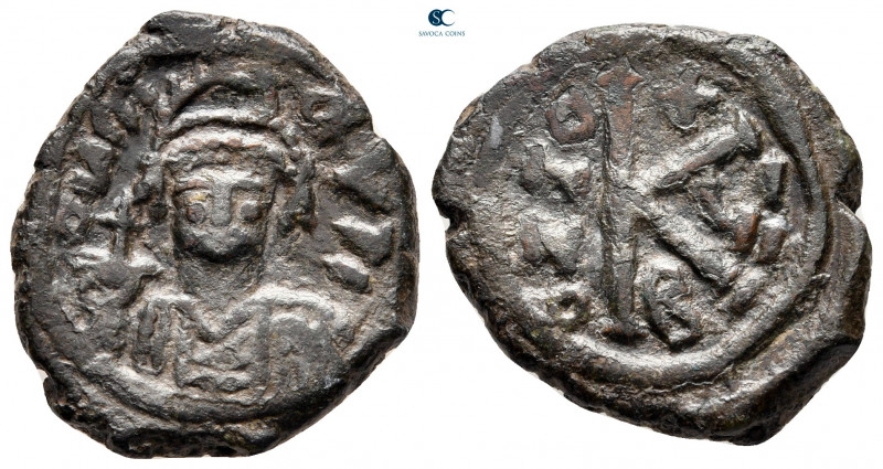 Maurice Tiberius AD 582-602. Constantinople
Half Follis or 20 Nummi Æ

20 mm,...