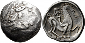 CARPATHIAN REGION. Uncertain tribe. Circa 2nd century BC. Tetradrachm (Silver, 25 mm, 13.68 g, 12 h), 'Kinnlos' type. Celticized laureate head of Zeus...
