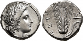 LUCANIA. Metapontion. Circa 325-275 BC. Didrachm or Nomos (Silver, 20 mm, 7.75 g, 12 h). Head of Demeter to right, wearing wreath of grain ears, tripl...