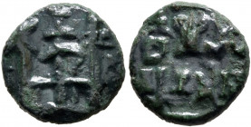 INDIA, Post-Mauryan (Panchala). Panchalas of Adhichhatra. Varunamitra, circa 50-20 BC. 1/2 Karshapana (Bronze, 12 mm, 1.41 g). Three standards on top ...