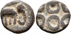 INDIA, Post-Mauryan (Deccan). Ishvakus. Anonymous issues, circa 227-306. Unit (Lead, 13 mm, 2.20 g). Elephant standing right. Rev. Four-orbed Ujjain s...