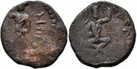 INDIA, Kushan Empire. Huvishka, circa 151-190. Tetradrachm (Bronze, 23 mm, 9.39 g, 12 h), Kapisha. Huvishka sits cross-legged on mountain top, head tu...