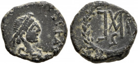 Marcian, 450-457. Nummus (Bronze, 11 mm, 1.11 g, 12 h), Constantinopolis. [D N MARCIA]NVS P F AVG Pearl-diademed, draped and cuirassed bust of Marcian...