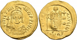 Justinian I, 527-565. Solidus (Gold, 20 mm, 4.41 g, 6 h), Constantinopolis, 545-565. D N IVSTINIANVS P P AVI Helmeted and cuirassed bust of Justinian ...