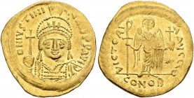 Justinian I, 527-565. Solidus (Gold, 20 mm, 4.31 g, 6 h), Constantinopolis, 545-565. D N IVSTINIANVS P P AVI Helmeted and cuirassed bust of Justinian ...
