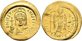 Justinian I, 527-565. Solidus (Gold, 21 mm, 4.38 g, 7 h), Constantinopolis, 545-565. D N IVSTINIANVS P P AVI Helmeted and cuirassed bust of Justinian ...