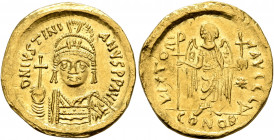 Justinian I, 527-565. Solidus (Gold, 20 mm, 4.24 g, 6 h), Constantinopolis, 545-565. D N IVSTINIANVS P P AVI Helmeted and cuirassed bust of Justinian ...