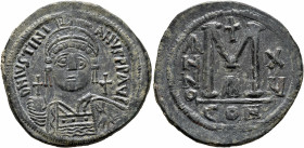 Justinian I, 527-565. Follis (Bronze, 39 mm, 22.44 g, 6 h), Constantinopolis, RY 15 = 541/2. D N IVSTINIANVS P P AVI Helmeted and cuirassed bust of Ju...