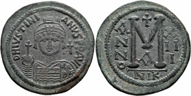 Justinian I, 527-565. Follis (Bronze, 41 mm, 22.32 g, 7 h), Nicomedia, RY 13 = 539/540. D N IVSTINIANVS P P AVI Helmeted and cuirassed bust of Justini...
