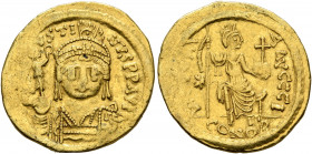 Justin II, 565-578. Solidus (Gold, 20.5 mm, 4.46 g, 6 h), Constantinopolis. D N IVSTINVS P P AVI Helmeted and cuirassed bust of Justin II facing, hold...