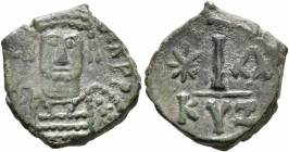 Maurice Tiberius, 582-602. Dekanummium (Bronze, 15 mm, 2.49 g, 12 h), Cyzicus. [D N MAVRIC TI]BЄR P P Helmeted and cuirassed bust of Maurice Tiberius ...