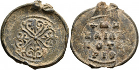 Michael, imperial notarios, 2nd half 10th-first half 11th century. Seal (Lead, 25 mm, 6.76 g). Cruciform design of palmettes and branches around a cen...