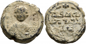 Uncertain, 11th century. Seal (Lead, 20.5 mm, 8.61 g, 9 h). [Θ / Γ]/Є/O/P-Γ/I/O, Nimbate facing bust of Saint George, holding spear over his right sho...
