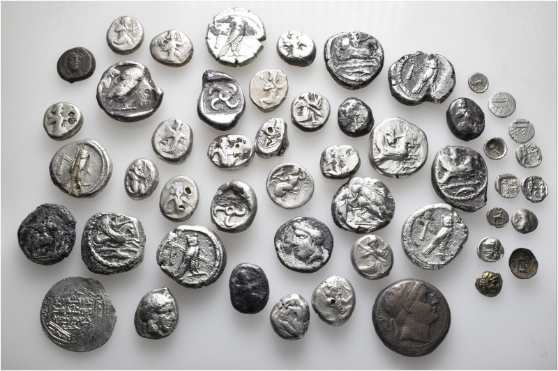 A lot containing 48 silver and 2 bronze coins. Includes: Greek and Islamic. Fine...