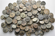 A lot containing 130 bronze coins. Includes: Greek and Roman Provincial. Fine to very fine. LOT SOLD AS IS, NO RETURNS. 130 coins in lot.