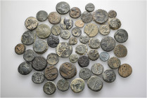 A lot containing 50 bronze coins. Includes: Greek and Roman Provincial. Fine to about very fine. LOT SOLD AS IS, NO RETURNS. 50 coins in lot.