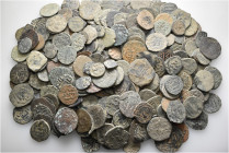 A lot containing 277 bronze coins. Mostly: Islamic. Fair to fine. LOT SOLD AS IS, NO RETURNS. 277 coins in lot.