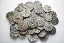 A lot containing 47 bronze coins. All: Islamic. Fair to good fine. LOT SOLD AS IS, NO RETURNS. 47 coins in lot.