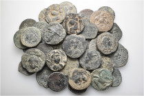 A lot containing 47 bronze coins. All: Islamic. Fair to good fine. LOT SOLD AS IS, NO RETURNS. 47 coins in lot.