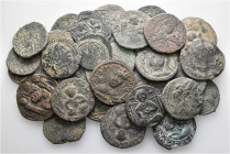A lot containing 37 bronze coins. All: Islamic. Faire to good fine. LOT SOLD AS IS, NO RETURNS. 37 coins in lot.