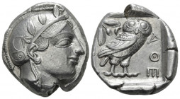 Attica, Athens Tetradrachm circa 450-445 BC, AR 23.00 mm., 17.15 g.
Head of Athena r., wearing crested Attic helmet with three olive leaves over viso...
