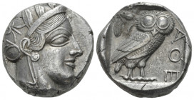 Attica, Athens Tetradrachm After 449, AR 23.00 mm., 17.20 g.
Head of Athena r., wearing Attic helmet decorated with olive wreath and palmette. Rev. O...