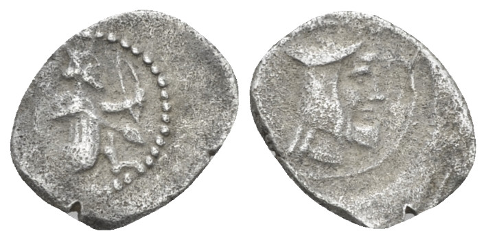 Asia Minor, Uncertain Mint Obol IV cent., AR 11.00 mm., 0.60 g.
Persian king or...