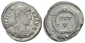 Valens, 364-378 Siliqua Constantinople circa 364-367, 18.70 mm., 1.90 g.
Pearl-diademed, draped and cuirassed bust r. Rev. VOT V within wreath; below...
