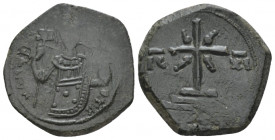 Manuel I Comnenus, 1143-1180 Tetarteron Thessalonica 1167-1183, Æ 20.60 mm., 3.96 g.
Half length figure of Manuel I holding labarum in r. hand and cr...