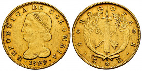 Colombia. 8 escudos. 1829. Bogotá. (Km-82.1). Au. 26,94 g. Used as a jewelry piece. Choice VF. Est...1200,00. 

Spanish Description: Colombia. 8 esc...