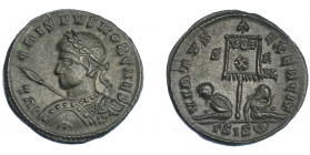 IMPERIO ROMANO. CRISPO (bajo Constantino I). Follis. Siscia (320). R/ Dos cautivos flanqueando estandarte con VOT/X, marca de ceca S-F/GSIS (creciente...