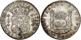 1765. Carlos III. Lima. JM. 8 reales. (Cal. 841). 26,95 g. Plata ligeramente agria. Columnario. Punto sobre la primera LMA. Escasa. MBC+/MBC.