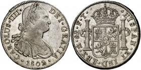 1802. Carlos IV. México. FT. 8 reales. (Cal. 698). 27 g. Leves rayitas. Parte de brillo original. MBC+/EBC-.