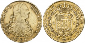 1791. Carlos IV. Sevilla. C. 8 escudos. (Cal. 174) (Cal.Onza 1187). 26,88 g. Rayita en anverso. Pátina atractiva. Ex Áureo & Calicó 11/12/2014, nº 606...