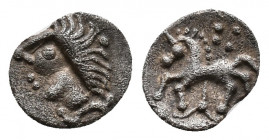 CENTRAL EUROPE, Vindelici. 1st century BC. AR Obol Manching II. (Stachelhaar) Type Av.: Celticized head to left, with stylized hair with pellets on en...