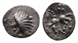 CENTRAL EUROPE, Vindelici. 1st century BC. AR Obol Manching II. (Stachelhaar) Type Av.: Celticized head to left, with stylized hair with pellets on en...