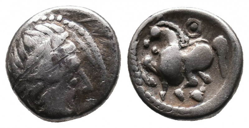 Eeastern Europe. AR Drachm (3rd century BC). "Dachreiter" type. Obv: Laureate he...
