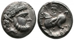 Eastern Europe. Dacian Plain. Third century BC. Silver tetradrachm. Baumreiter type. Av.: Laureate and bearded head of Zeus right / Horseman riding le...