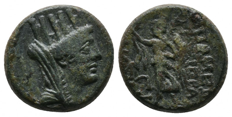 Syria, Seleukis and Pieria. Apameia. Ca. 1st century B.C. AV.: Turreted and veil...