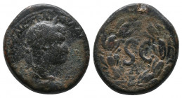 Roman Provincial. Antioch, Seleucis and Pieria. Av.: ΑΥΤΟΚΡ ΚΑΙϹ ΤΡΑΙΑΝ ΑΔΡΙΑΝΟϹ ϹΕΒ; laureate head of Hadrian, r. Rv.: S C; in laurel wreath; beneath...