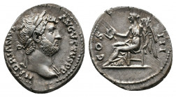 Hadrian AD 117-138. AR Denarius. Rome, struck circa AD 124-128. Av.: Laureate head right Rv.: Victory seated left, holding wreath and palm frond. RIC ...