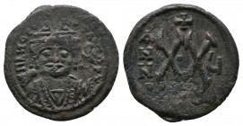 Maurice Tiberius, 582-602. Half Follis, Theoupolis (Antiochia), struck 585/586

Obv.: ΠINO… Crowned facing bust of Maurice Tiberius, wearing crown s...