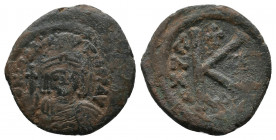 Maurice Tiberius, 582-602 AD, Constatninople Mint, struck 591/592 AD.

Obv: Crowned and draped bust of Maurice Tiberius facing, holding globus cruci...